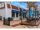 Commercial property featuring outdoor seating and a covered patio area at 1130 S Cook St, Denver, CO 80210