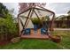 Charming gazebo with cozy seating around a fire pit, ideal for intimate gatherings and enjoying the outdoors at 8229 Estes Ct, Arvada, CO 80005