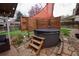 Backyard hot tub surrounded by a privacy fence, offering a secluded spot for relaxation and rejuvenation at 8229 Estes Ct, Arvada, CO 80005