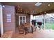 Charming outdoor patio featuring a grilling area, string lights, dining table with bench seating for outdoor gatherings at 8229 Estes Ct, Arvada, CO 80005