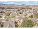 Scenic neighborhood surrounded by rolling hills, showcasing lush landscapes, and variety of well-maintained homes at 2649 S Kline Cir, Lakewood, CO 80227