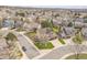 Residential street featuring manicured lawns, mature trees, and well-kept homes in a suburban neighborhood at 2649 S Kline Cir, Lakewood, CO 80227