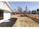 Large backyard with potential for landscaping and outdoor activities at 11825 W 25Th Ave, Lakewood, CO 80215