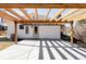 Covered patio area perfect for outdoor entertaining at 11825 W 25Th Ave, Lakewood, CO 80215