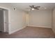 Comfortable bedroom with neutral carpet and ample natural light at 12033 E Harvard Ave # 208, Aurora, CO 80014