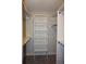 Organized walk-in closet with built-in shelving and ample storage space at 12033 E Harvard Ave # 208, Aurora, CO 80014