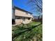 Spacious backyard featuring a lawn, patio, and a wood fence, perfect for outdoor activities at 1062 Timbervale Trl, Highlands Ranch, CO 80129