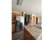 Modern kitchen with stainless steel appliances, an island and wood cabinets at 1062 Timbervale Trl, Highlands Ranch, CO 80129