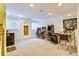 Spacious basement featuring an arcade, with pinball and various arcade games, perfect for entertaining at 1011 S Valentia St # 147, Denver, CO 80247