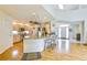 Open-concept kitchen featuring an island with bar seating, modern appliances, and abundant cabinet space at 1011 S Valentia St # 147, Denver, CO 80247