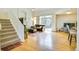 Living room with hardwood floors, fireplace and access to the outdoor patio at 1011 S Valentia St # 147, Denver, CO 80247