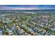 Residential neighborhood with mature trees and community amenities, viewed from above at 4279 Brandon Ave, Broomfield, CO 80020