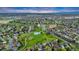 Aerial view featuring lush green spaces, neighborhood streets, and community amenities at 4279 Brandon Ave, Broomfield, CO 80020