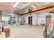 Unfinished basement with storage, water tank and exposed ceiling at 4279 Brandon Ave, Broomfield, CO 80020