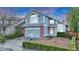 Charming two-story home with a two-car garage, neat landscaping, and a welcoming entrance at 4279 Brandon Ave, Broomfield, CO 80020