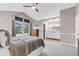 Spacious main bedroom with vaulted ceilings, ceiling fan and a connecting bathroom at 4279 Brandon Ave, Broomfield, CO 80020