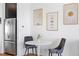 Bright dining area featuring contemporary decor, neutral tones, and modern accents at 2150 S Delaware St, Denver, CO 80223