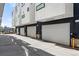 Private garages with ample space for parking and storage with modern architecture at 2150 S Delaware St, Denver, CO 80223