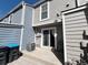 Backyard area features a patio, outdoor seating, and an air conditioning unit at 10561 W Dartmouth Ave, Lakewood, CO 80227