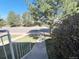 Exterior view showcasing the concrete steps leading to the front door with railings at 10561 W Dartmouth Ave, Lakewood, CO 80227