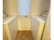 Functional laundry room features a washer, a dryer, and natural light at 10561 W Dartmouth Ave, Lakewood, CO 80227