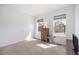 Bright bedroom featuring two large windows providing ample natural light at 11791 Barrentine Loop, Parker, CO 80138