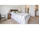 Well lit bedroom with a full sized bed and carpet flooring at 11791 Barrentine Loop, Parker, CO 80138