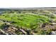 Breathtaking aerial view highlighting a well-maintained golf course at 6519 Pinewood Dr, Parker, CO 80134