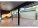 This covered back porch with a patio would be great for outdoor living at 6519 Pinewood Dr, Parker, CO 80134