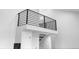 Balcony with black railing overlooks the open floor plan at 6519 Pinewood Dr, Parker, CO 80134