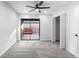 Bedroom featuring sliding glass doors leading to private deck at 6519 Pinewood Dr, Parker, CO 80134