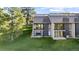 Two story house exterior featuring a cozy balcony and well-maintained lawn at 6519 Pinewood Dr, Parker, CO 80134