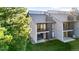 Two story house exterior featuring a cozy balcony and well-maintained lawn at 6519 Pinewood Dr, Parker, CO 80134