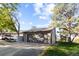 The front of the house features a garage and yard at 6519 Pinewood Dr, Parker, CO 80134