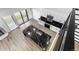 Modern kitchen features white cabinets, stainless steel appliances, and a black marbled island countertop at 6519 Pinewood Dr, Parker, CO 80134
