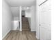 Hallway view of the staircase leading to the upper floors at 6519 Pinewood Dr, Parker, CO 80134