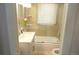 Clean bathroom with modern fixtures and a shower-tub combination at 832 S Gilpin St, Denver, CO 80209