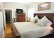 Relaxing bedroom with a queen-sized bed and soft, neutral bedding at 832 S Gilpin St, Denver, CO 80209