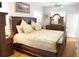 Comfortable bedroom with hardwood floors and traditional furnishings at 832 S Gilpin St, Denver, CO 80209