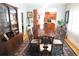 Formal dining room with large wooden table and classic decor at 832 S Gilpin St, Denver, CO 80209