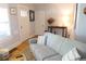 Cozy living room with comfortable seating and hardwood floors at 832 S Gilpin St, Denver, CO 80209