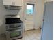 Well-equipped kitchen featuring stainless steel appliances and plenty of cabinet space for storage at 5899 Vance St, Arvada, CO 80003