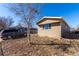 The backyard is fenced in with the back of the home in clear view at 119 Yakima St, Lochbuie, CO 80603