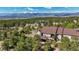 Scenic aerial view of the property with a deck and mountain views in the distance at 17575 Minglewood Trl, Monument, CO 80132