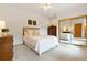 Bright bedroom with neutral tones, mirrored closet doors, plush carpet and natural light at 17575 Minglewood Trl, Monument, CO 80132
