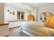 Bright bedroom with a view of boulder landscaping outside the window at 17575 Minglewood Trl, Monument, CO 80132