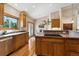 Well-designed kitchen with hardwood cabinets, stainless appliances, and open layout at 17575 Minglewood Trl, Monument, CO 80132