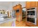 Spacious kitchen with stainless steel appliances, and a walk-in pantry at 17575 Minglewood Trl, Monument, CO 80132