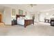 Large main bedroom with neutral walls, carpeted floors, and scenic view from a window at 17575 Minglewood Trl, Monument, CO 80132