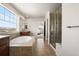 Bright bathroom with a soaking tub, stand up shower and views of the exterior at 3654 Paintbrush Ln, Parker, CO 80138